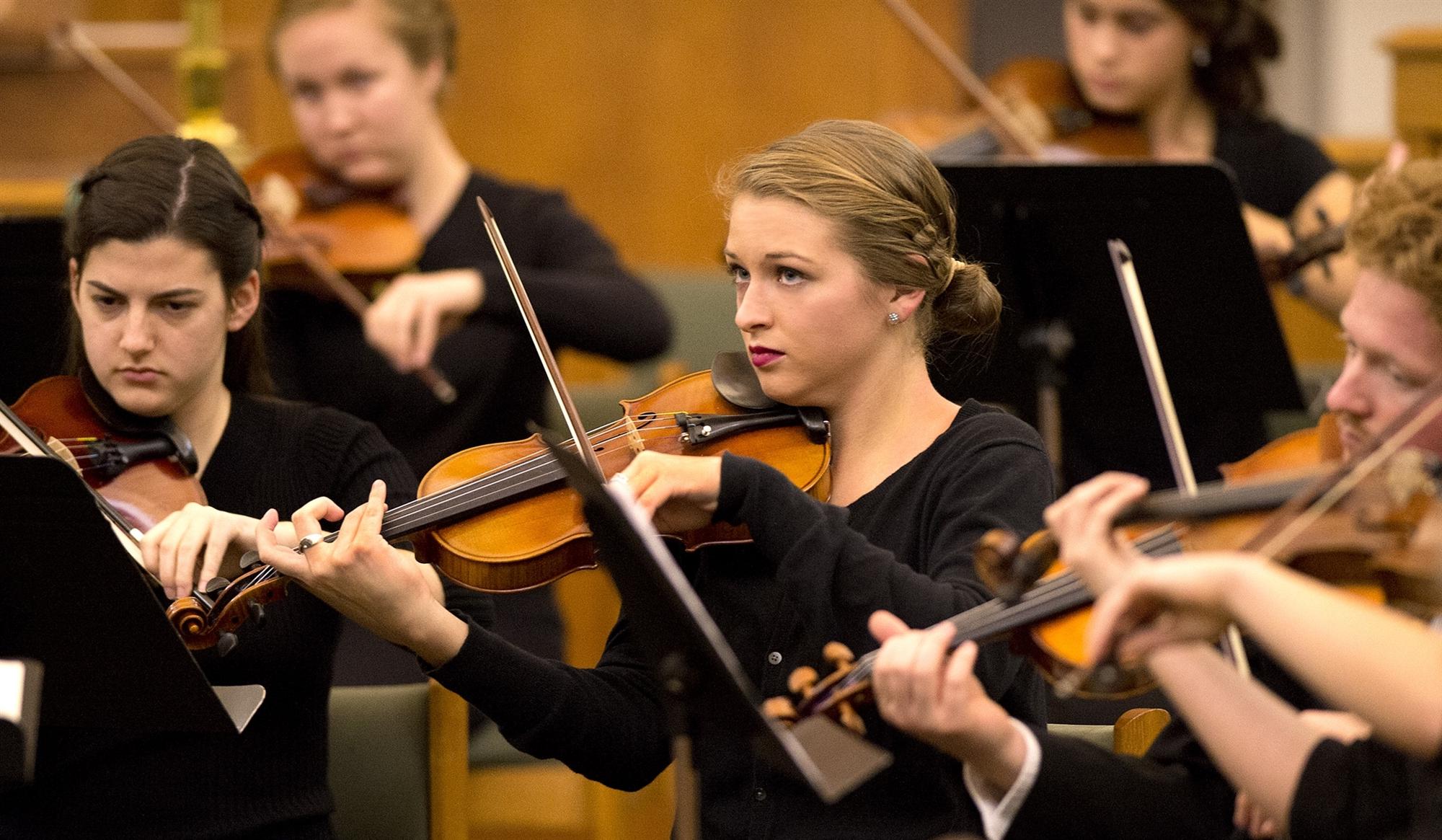 student playing violin